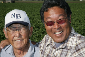 Tom Ikda, right, looks to his uncle Kaz Ikeda as an invaluable farming resource. Kaz, now 90, has been farming in the area since the late 1920s.